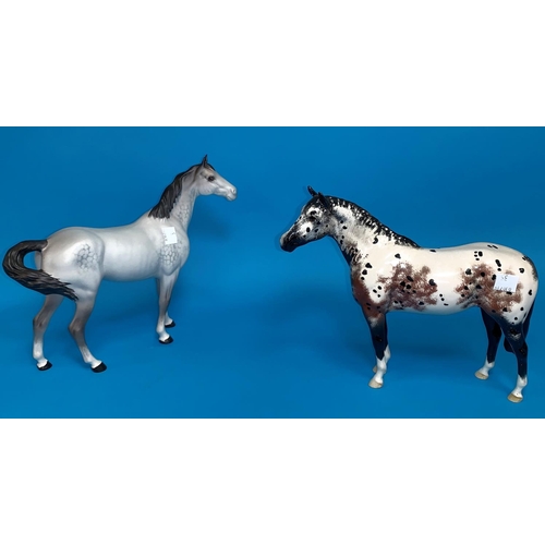 35 - A Beswick Appaloosa pony; a Beswick bisque dapple grey horse