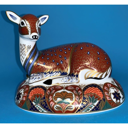 54 - A Royal Crown Derby figure of a reclining Doe