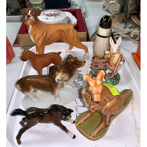 75 - A Royal Doulton Penguin, Beswick Boxer dog, Beswick Bulldog, Wade Kangaroo and other china animals