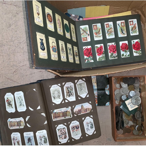 299 - A quantity of old coins, cigarette cards etc