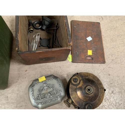 450 - A pair of WWII night goggles in military box; a boxed brass primus stove; a compass; a trinket box a... 