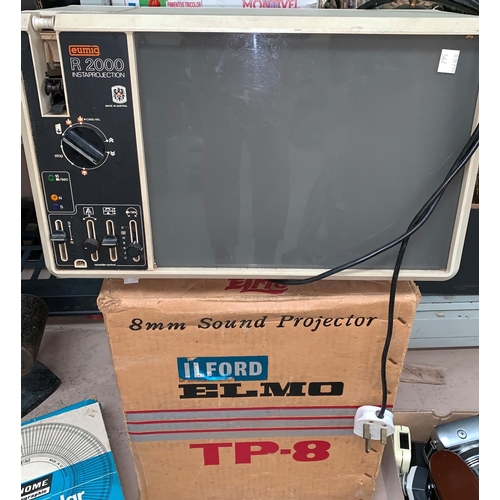 567 - An Elmo Ilford 8mm sound projector; a folding projector screen, 2 1980's/90's video camera and anoth... 