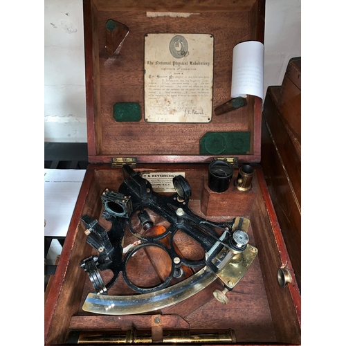 577 - A vintage marine sextant 1919 (ex Cunard) by Johannson of London, in brass and japanned metal with s... 