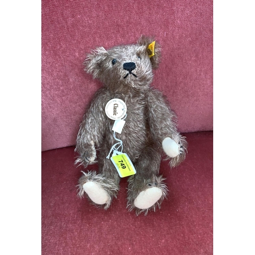 749 - A small Steiff Classic Teddy Bear with ear pin and label