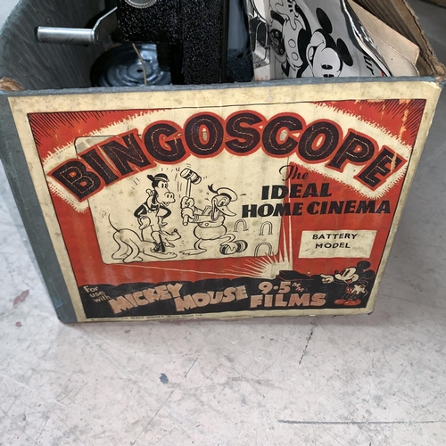 780 - An originally boxed Bingoscope 'The Ideal Home Cinema' for use with Mickey Mouse films, with instruc... 