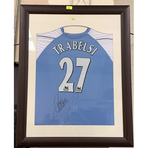 601 - A Manchester City shirt signed by Hatem Trabelsi, f&g