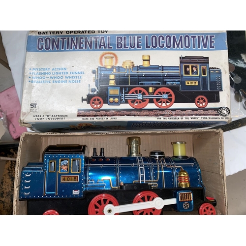 781 - A Boxed Battery operated Continental Blue Locomotive by Trade Mark toys