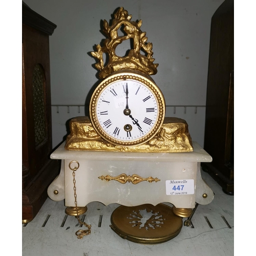 405 - A 19th century mantel clock in gilt metal and alabaster, white enamel dial and French timepiece move... 