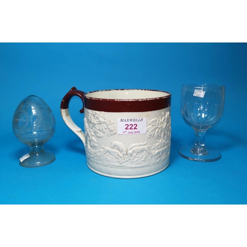 222 - A 19th century Davenport cylindrical mug in salt glazed stoneware, with brown glazed rim, decorated ... 
