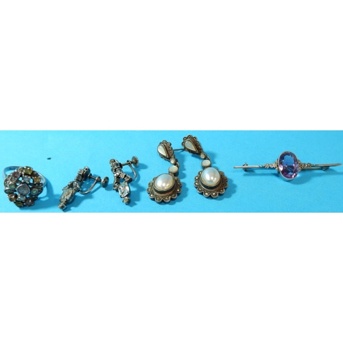 311 - A sterling silver bar brooch; 2 pairs of earrings; a ring set semi-precious stones