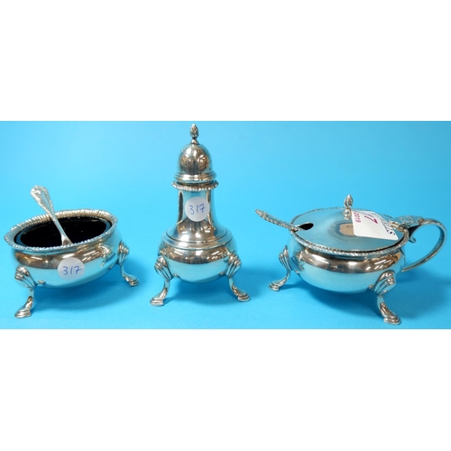 317 - A Georgian style 3 piece cruet of baluster form, with gadrooned borders and hoof feet, comprising pe... 