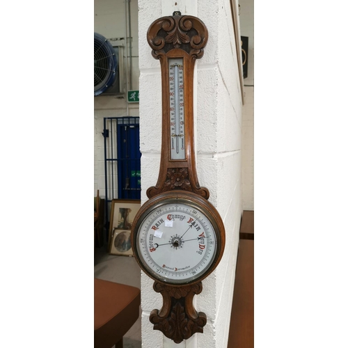 442 - A late Victorian oak banjo barometer