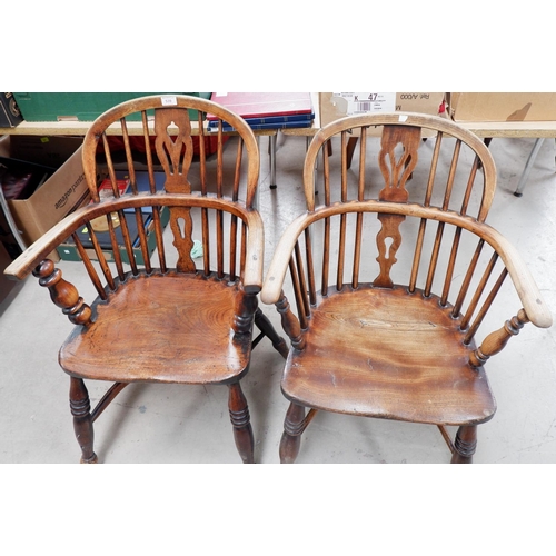 539 - A 19th century near pair of Windsor chairs with low backs and crinoline stretcher