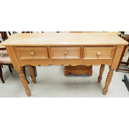 601 - A Victorian style pine side table with frieze drawer, on turned legs