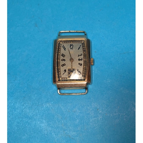 338 - A 1920's gents Trebex rectangular wristwatch, 9 carat  gold case