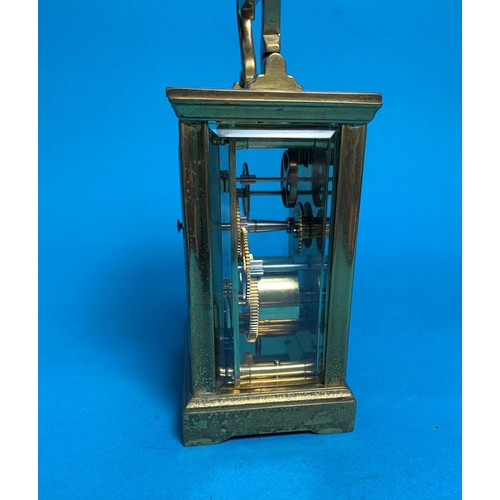441 - A brass carriage clock with enamel dial