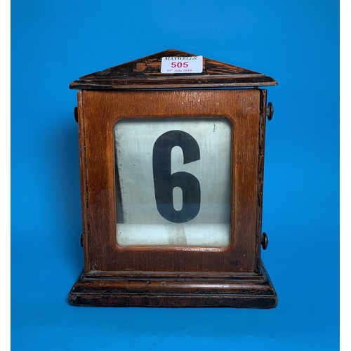 505 - A late 19th century American chiming mantel clock in oak case; a wooden pen stand/calendar; a brass ... 