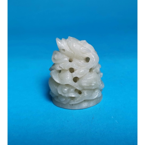284a - A small white hardstone carving of a coiled dragon, height 2