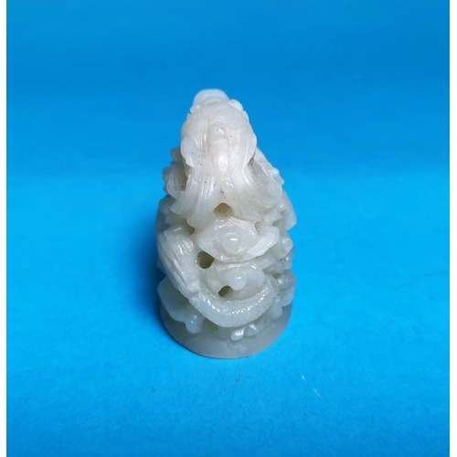 284a - A small white hardstone carving of a coiled dragon, height 2