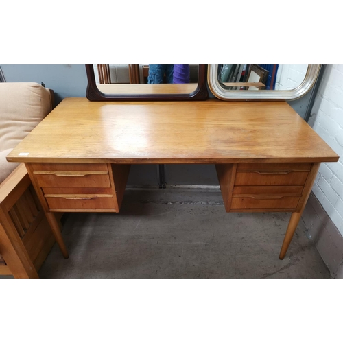 568 - A light oak  desk with drawers either side