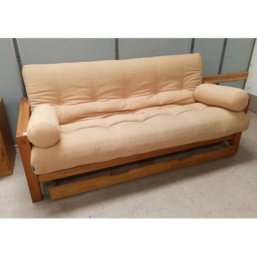 591 - A light oak double futon bed
