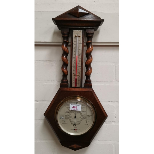 465 - A 1930's oak cased barometer with thermometer; a 1930's mantel clock with battery movement; a reprod... 