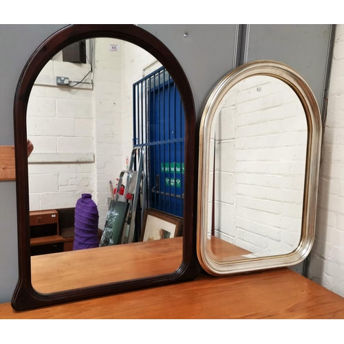532 - A modern wall mirror in arched mahogany finish frame; a similar in giltwood frame, 36