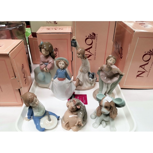 189 - A selection of 7 Nao porcelain figures
