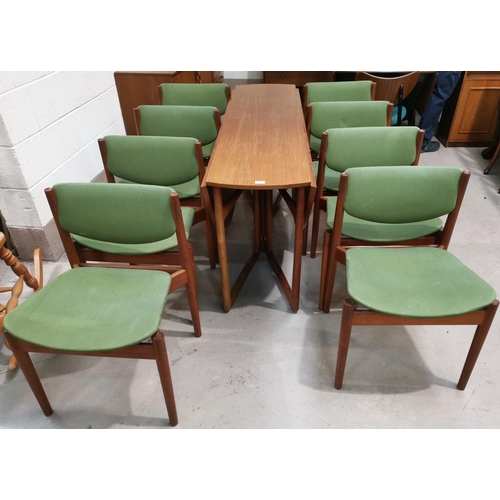 541 - A 1960's teak dining suite comprising oval drop leaf table and 8 chairs,in green fabric, by Charles ... 