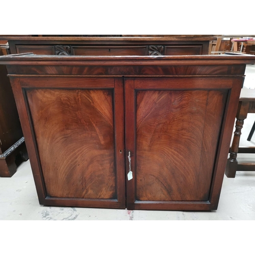 555 - A 19th century mahogany 2 door side cabinet