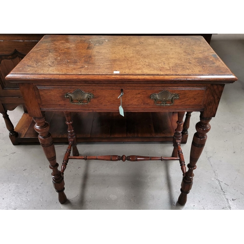 558 - An Edwardian burr oak side table with 2 drawers, on turned legs