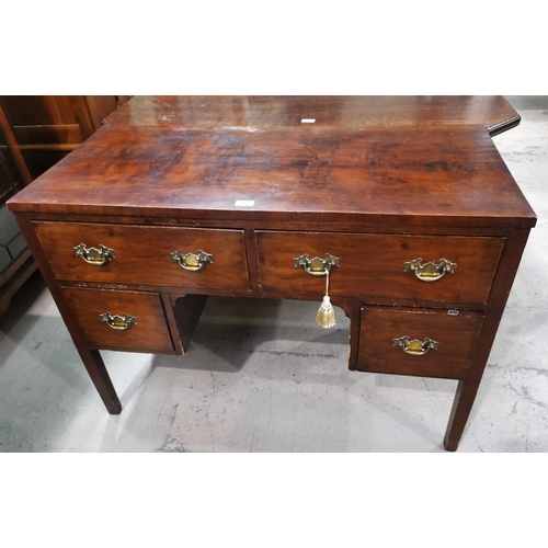 586 - A 19th century mahogany kneehole desk of 4 drawers with brass fittings