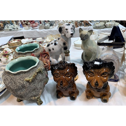 202 - An Art Pottery cat signed 'P F Alexander'; a similar dog; a pair of lion money boxes; a pair of encr... 