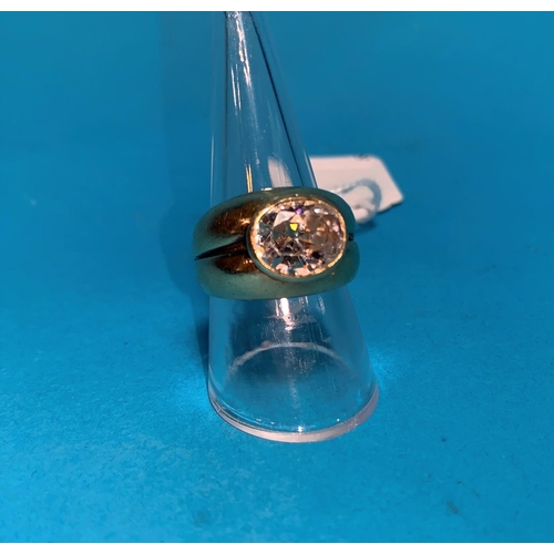 356 - A gent's 9 carat hallmarked gold gypsy style ring, the split shank set large simulated oval diamond,... 