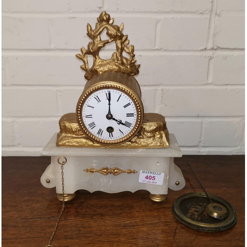 405 - A 19th century mantel clock in gilt metal and alabaster, white enamel dial and French timepiece move... 