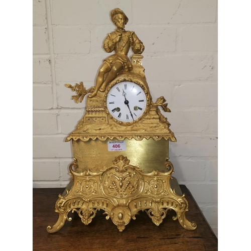 406 - A 19th century French mantel clock in ormolu case surmounted by a reclining man in renaissance dress... 