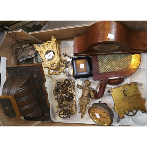 411 - A 19th century rococo ormolu clock case and clock parts