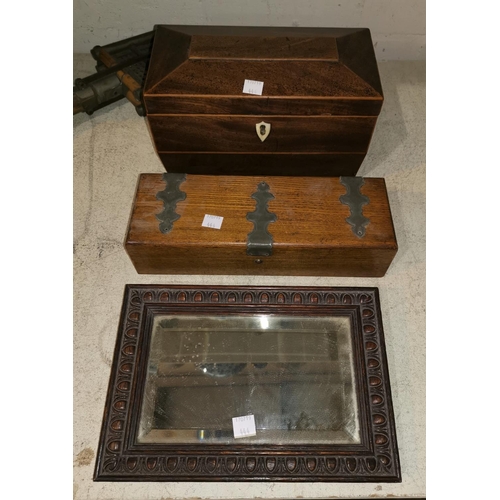 444 - A Georgian mahogany sarcophagus shaped tea caddy; a mirror; a brass bound box