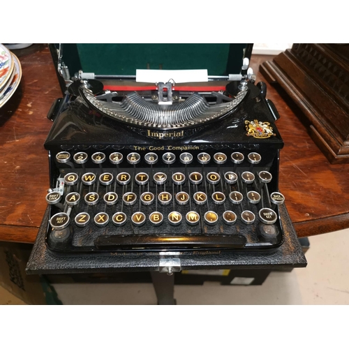 458 - A vintage Imperial typewriter, cased