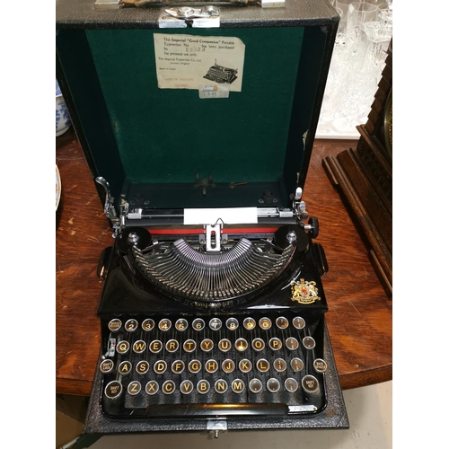 458 - A vintage Imperial typewriter, cased