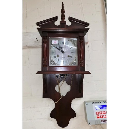 466 - A mahogany reproduction wall clock, weight driven 30 day movement