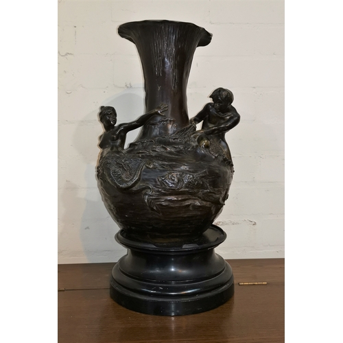 487 - A large Art Nouveau (c.1900) patinated bronzed vase with naked male and female mermaid figures with ... 