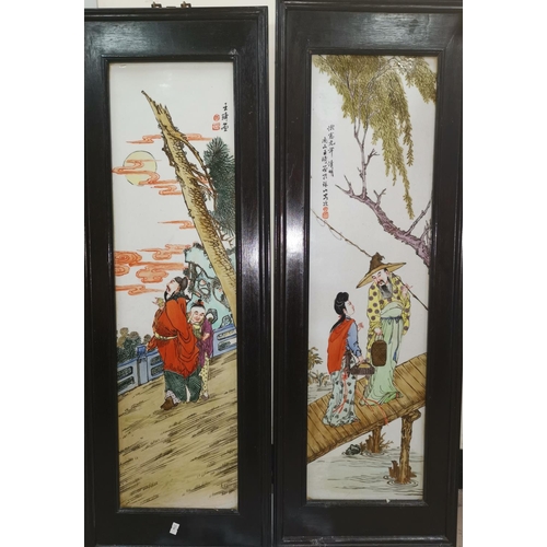 280A - A pair of Chinese porcelain wall hanging rectangular plaques with traditional scenes and signatures