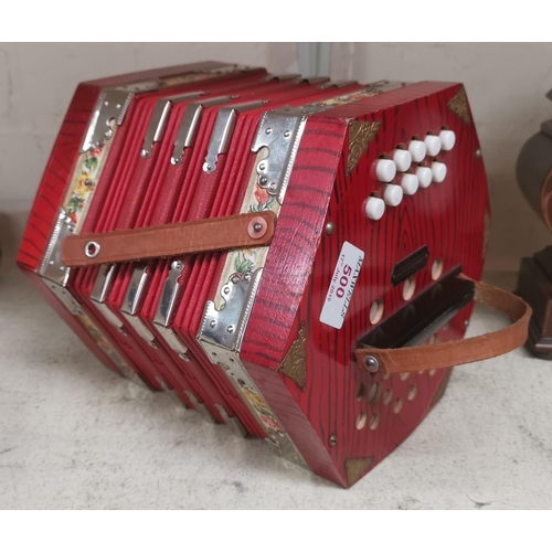 500 - A modern Scholer concertina with 10 buttons to each end, made in Germany