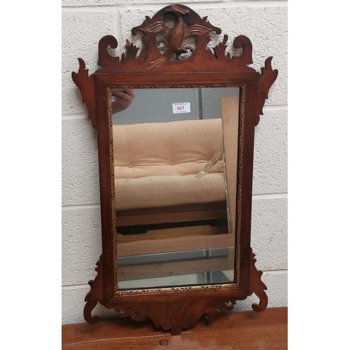 528 - A large bevelled edge wall mirror