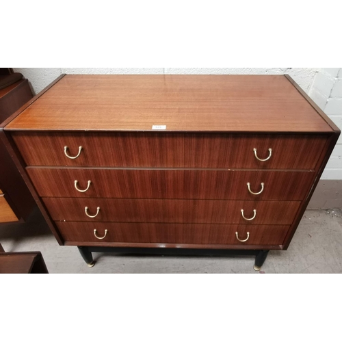 575 - A 1960's G-Plan walnut 4 height chest of drawers on ebonised legs