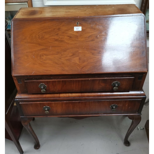587 - A reproduction fall front bureau with 2 drawers, on cabriole legs