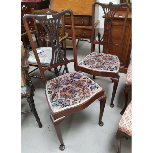 596 - An Edwardian set of 3 mahogany salon chairs