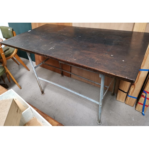 604 - A metal framed industrial table