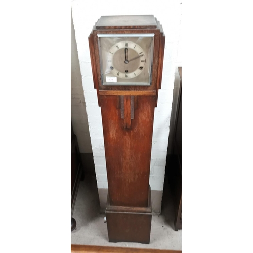 628a - A 1930's oak cased granddaughter clock with 3 train 8 day movement, 55